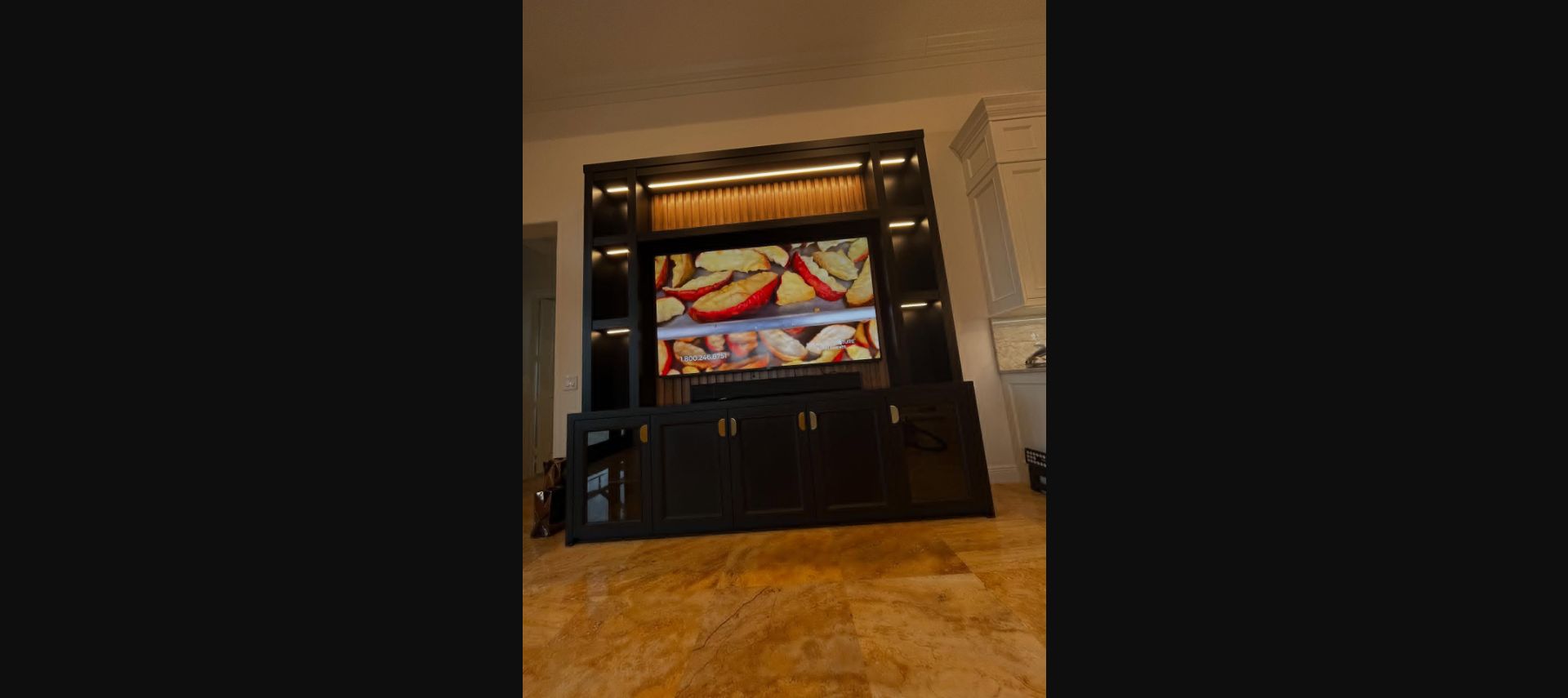 Illuminated entertainment built-in by Marc's Custom Designs